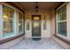 Front entry with an iron door and tile flooring at 1616 W Sierra Sunset Trl, Phoenix, AZ 85085