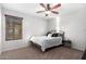 Bedroom with a full-size bed and ceiling fan at 17769 W Alexandria Way, Surprise, AZ 85388