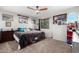 Spacious Primary bedroom with king-size bed and decorative accents at 17769 W Alexandria Way, Surprise, AZ 85388