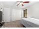Bright bedroom with double doors and carpet flooring at 17769 W Alexandria Way, Surprise, AZ 85388