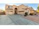 Two-story house with a three-car garage and landscaping at 17769 W Alexandria Way, Surprise, AZ 85388