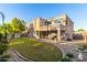 Two-story house with backyard, landscaping, and patio at 17769 W Alexandria Way, Surprise, AZ 85388