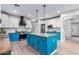 Spacious kitchen with granite countertops, stainless steel appliances, and a large island at 17769 W Alexandria Way, Surprise, AZ 85388