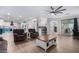 Open floor plan living area with hardwood floors and access to backyard at 17769 W Alexandria Way, Surprise, AZ 85388