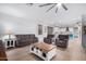 Bright living room boasts hardwood floors and an open concept design at 17769 W Alexandria Way, Surprise, AZ 85388