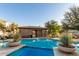 Community pool and spa with adjacent lounge chairs at 2004 E Heartwood Ln, Phoenix, AZ 85022