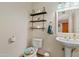 Small bathroom with pedestal sink and updated shelving at 2232 W Lindner Ave # 44, Mesa, AZ 85202