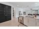 Sleek kitchen island with white cabinets and stainless steel appliances at 23079 E Stacey Rd, Queen Creek, AZ 85142