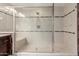 Large walk-in shower with tiled walls and built-in seat at 2707 S 103Rd Dr, Tolleson, AZ 85353