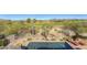 Stunning aerial view showcasing the pool and golf course backdrop at 3110 Arroyo Hondo --, Carefree, AZ 85377
