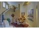 Formal dining room with wood table, seating for six, and a staircase nearby at 3110 Arroyo Hondo --, Carefree, AZ 85377
