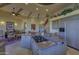 Spacious kitchen island with gas cooktop, granite countertops, and custom cabinetry at 3110 Arroyo Hondo --, Carefree, AZ 85377