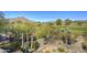 Landscaped yard with desert plants and golf course views at 3110 Arroyo Hondo --, Carefree, AZ 85377