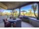 Outdoor dining area on patio with built-in grill at 3110 Arroyo Hondo --, Carefree, AZ 85377