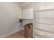 Large walk-in closet with shelving and hanging rod at 5428 E Yolantha St, Cave Creek, AZ 85331