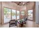 Relaxing sunroom with pool view and comfortable seating at 5428 E Yolantha St, Cave Creek, AZ 85331