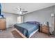 Spacious bedroom with king-size bed and ceiling fan at 590 W 12Th St, Florence, AZ 85132