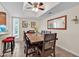 Charming dining area with wood table and seating at 7061 E Broadway Rd # 58, Mesa, AZ 85208