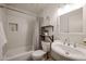 Clean bathroom with a tub and updated vanity at 723 W 5Th Ave, Apache Junction, AZ 85120