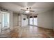 Bedroom with tile floors, french doors and ceiling fan at 723 W 5Th Ave, Apache Junction, AZ 85120