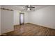 Bright bedroom with wood floors and ceiling fan at 723 W 5Th Ave, Apache Junction, AZ 85120