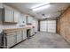 Bright garage with built-in cabinets and workbench at 723 W 5Th Ave, Apache Junction, AZ 85120