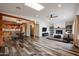 Open concept living and kitchen area with wood-look floors at 723 W 5Th Ave, Apache Junction, AZ 85120