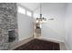 Elegant dining area adjacent to the kitchen and fireplace at 7331 E Valley Vista Dr, Scottsdale, AZ 85250