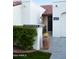 Front entry with tile walkway, and a large terracotta pot at 7331 E Valley Vista Dr, Scottsdale, AZ 85250