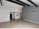 Bright living room featuring high ceilings, wood-look floors, and a fireplace at 7331 E Valley Vista Dr, Scottsdale, AZ 85250