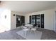 Cozy patio with white metal table and chairs, ideal for outdoor dining at 7331 E Valley Vista Dr, Scottsdale, AZ 85250
