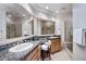 Double vanity bathroom with a shower and granite countertop at 8595 E Bronco Trl, Scottsdale, AZ 85255