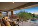 Spacious covered patio offering scenic sunset views at 8595 E Bronco Trl, Scottsdale, AZ 85255