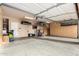 Garage with overhead storage and ample space at 8813 S 13Th Pl, Phoenix, AZ 85042