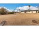 Large backyard with gravel and desert landscaping at 9871 W Picacho Ct, Sun City, AZ 85373