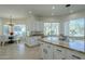 Modern kitchen with granite countertops and a large island at 9948 N 119Th Pl, Scottsdale, AZ 85259