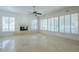 Spacious living room with fireplace and plantation shutters at 9948 N 119Th Pl, Scottsdale, AZ 85259