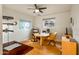 Bright home office with built-in shelving and hardwood floors at 1318 E Echo Ln, Phoenix, AZ 85020