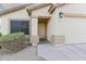 House exterior showing front door and part of garage at 15881 W Moreland W St, Goodyear, AZ 85338