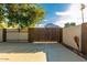 Wooden gate leading to backyard at 2606 N 89Th Dr, Phoenix, AZ 85037