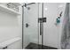 Bathroom with a large walk-in shower and hexagon tile flooring at 2811 E Riviera Pl, Chandler, AZ 85249