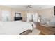Main bedroom with ensuite bathroom access and sitting area at 2811 E Riviera Pl, Chandler, AZ 85249