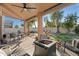 Covered patio with seating area and fire pit at 2811 E Riviera Pl, Chandler, AZ 85249