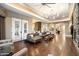 Elegant living room featuring hardwood floors and French doors at 33014 N 53Rd Pl, Cave Creek, AZ 85331