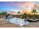 Resort-style pool and spa with fire features and tranquil desert landscape at 33014 N 53Rd Pl, Cave Creek, AZ 85331