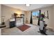 Home office with standing desk, and exercise equipment at 3502 E Janice Way, Phoenix, AZ 85032
