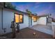 Front view of a single story home with a light teal door and cacti at 3502 E Janice Way, Phoenix, AZ 85032