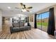 Open concept living area with hardwood floors and backyard access at 3502 E Janice Way, Phoenix, AZ 85032