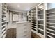 Large walk-in closet with ample shelving and drawers at 5311 N Palo Cristi Rd, Paradise Valley, AZ 85253