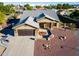 Single story home with a large yard and a two-car garage at 5701 N 105Th Ln, Glendale, AZ 85307